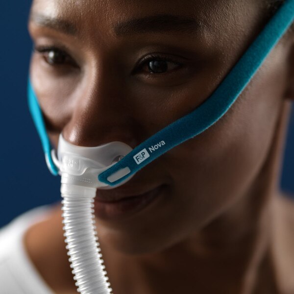 Woman Wearing Nova Micro CPAP Mask